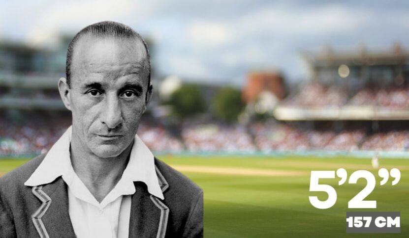 A black-and-white photo of a cricketer in a blazer with a serious expression, set against a blurred modern cricket field background